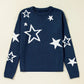 Soft navy sweater with white star print, made from 100% cotton for breathable comfort.

