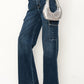 Vintage wide-leg jeans with pockets and a modern high-rise waist.
