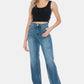 Raw hem detail on trendy tummy control jeans.
