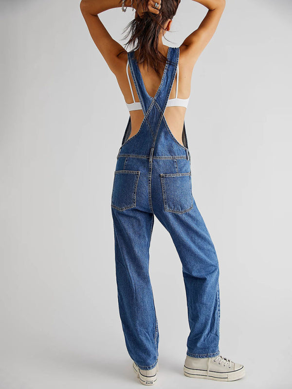 Blue woven overalls featuring functional welt pockets for women.
