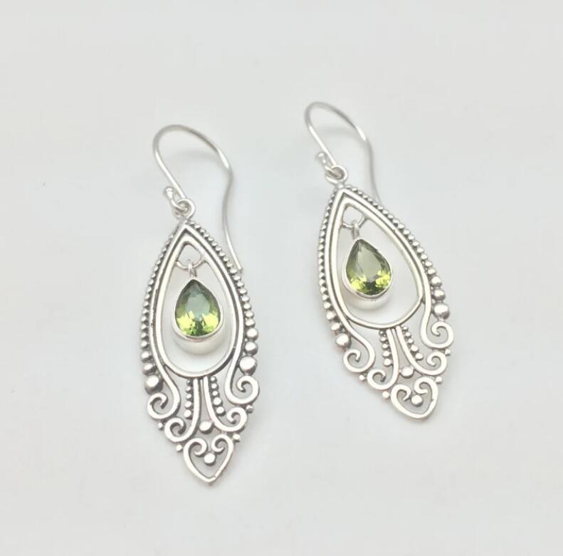 Statement earrings with alloy cutout and rhinestone accents