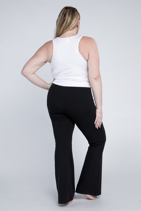 Full-length black flare bottoms designed for a flattering fit.
