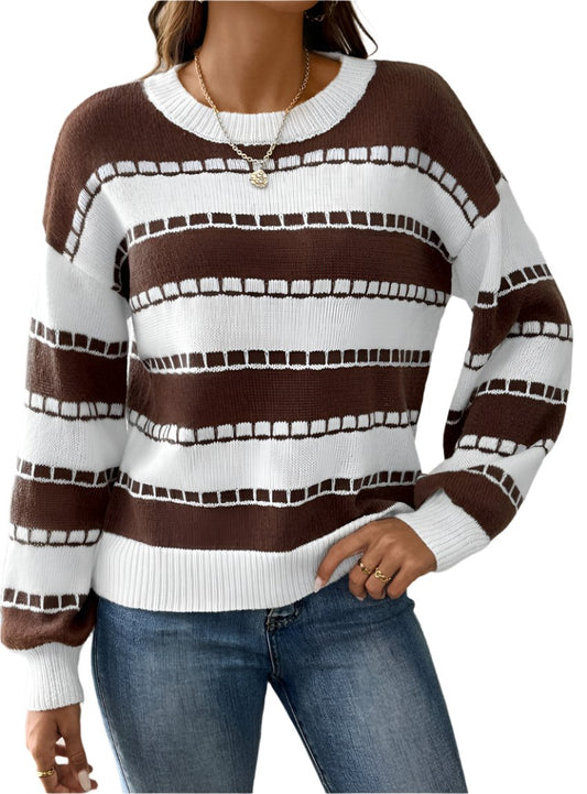 Woman wearing a brown striped knit crewneck sweater with jeans