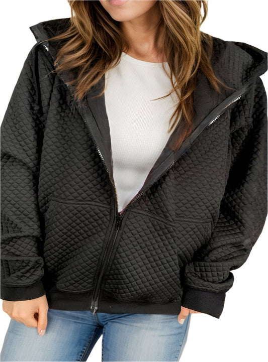 Cozy black hooded jacket featuring a zip closure and adjustable drawstring.
