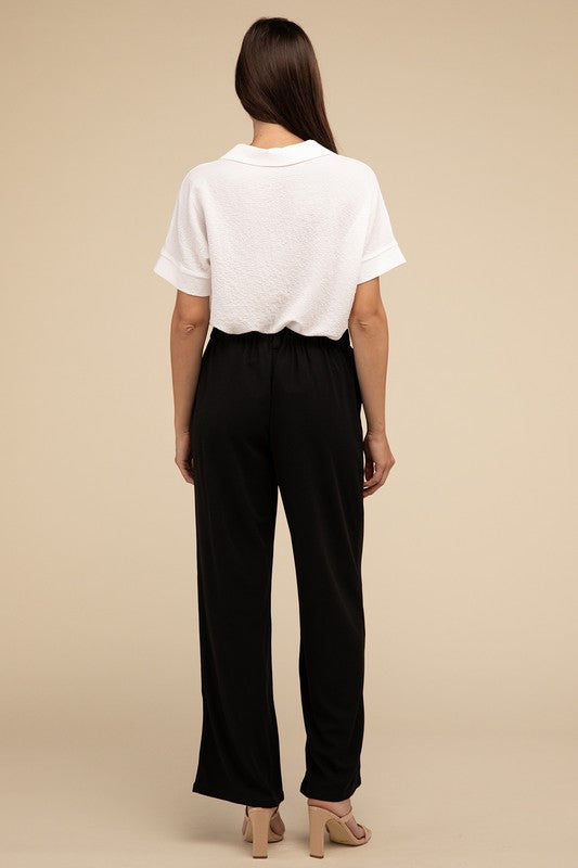 Stylish black waffle trousers for versatile wear
