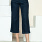 Women’s cropped wide-leg jeans with side seam braiding.
