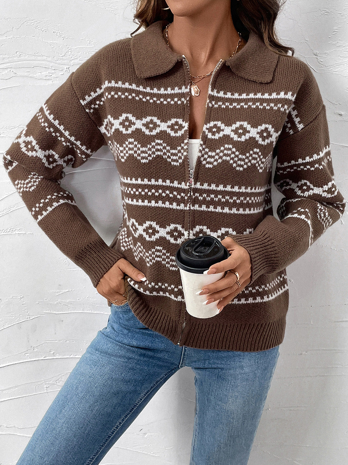 Soft knit Fair Isle cardigan in brown, featuring a relaxed fit and classic pattern.
