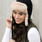 Stylish cable weave winter hat with pom accents
