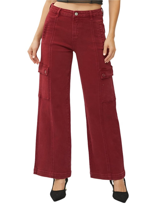 Front view of red risen wide leg cargo jeans with high-rise waist, styled with black heels.
