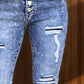 Comfortable Distressed Button-Fly Bootcut Jeans designed with durable denim and flattering bootcut silhouette.