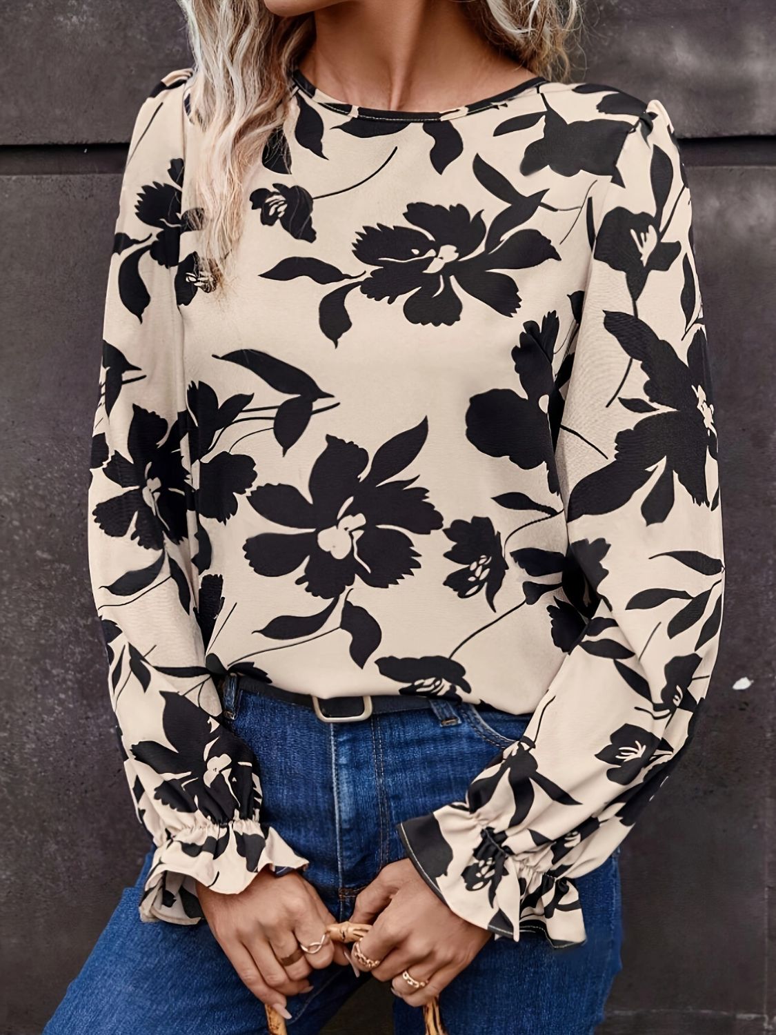 Stylish printed blouse with unique bow back
