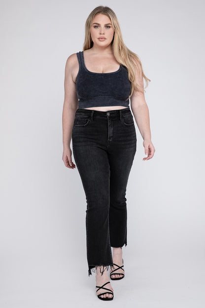 Black denim plus-size crop flare jeans styled for casual or chic outfits.
