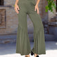 Flattering high-waisted ruffle hem pants in green
