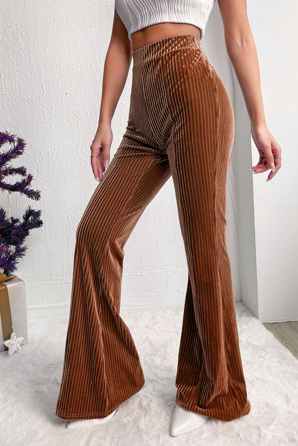 Retro mocha high-waist pants with a flattering flared silhouette.
