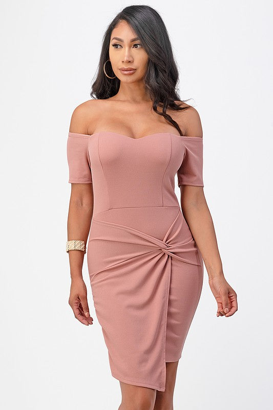 Classic pink bodycon dress with a twist front design and stretch fabric for comfort.
