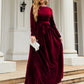 Elegant red velvet dress with belted waist
