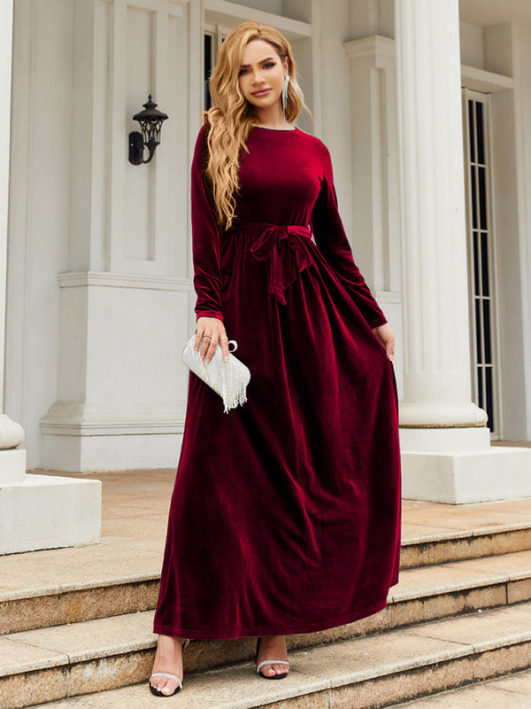 Elegant red velvet dress with belted waist
