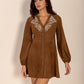 Embroidered caramel dress with suede-like fabric and buttons
