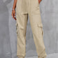 Tan buttoned high-waist cargo pants shown in a front view.
