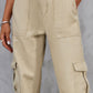 Tan high-waist pants with pockets for a stylish and practical design.
