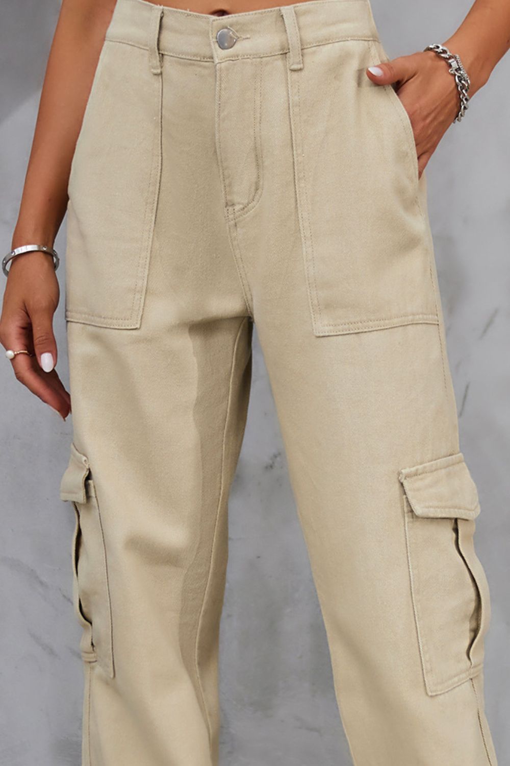 Tan high-waist pants with pockets for a stylish and practical design.
