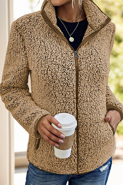 Tan women's fleece sherpa jacket, perfect for layering during winter.
