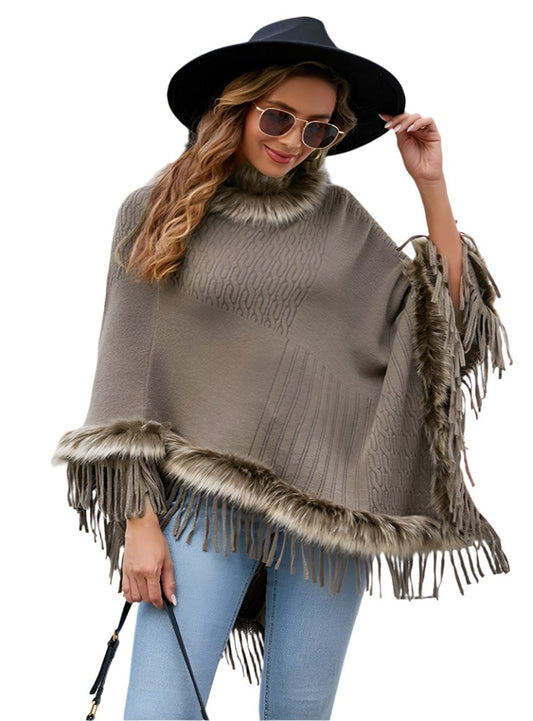 Taupe poncho with faux fur trim and fringe
