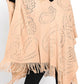 Taupe paisley perforated knit poncho with fringe hem, front view.
