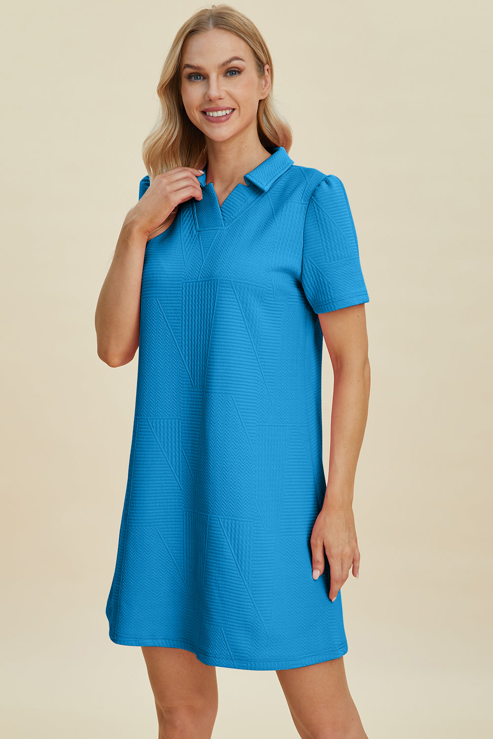 Blue textured dress with short sleeves and collar