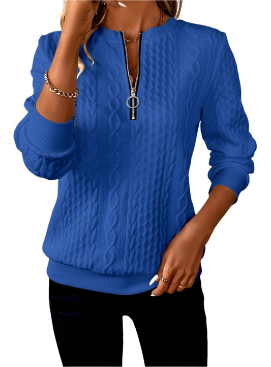 Front view of blue textured half-zip sweatshirt with cable-knit design
