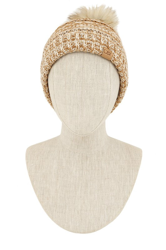 Comfortable camel beanie with detailed chevron design and fur accent

