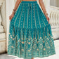 Tiered green skirt with bohemian print and flowing fit.