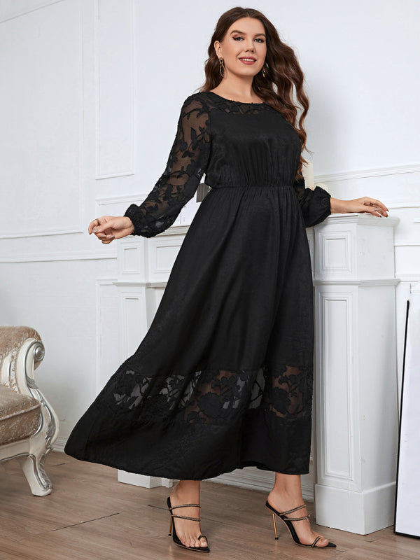 Black dress with lace neckline, perfect for evening wear.
