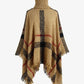 Cozy caramel plaid poncho with fringe and turtleneck design.
