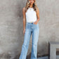 Front view of durable high-waist light wash jeans with no stretch.
