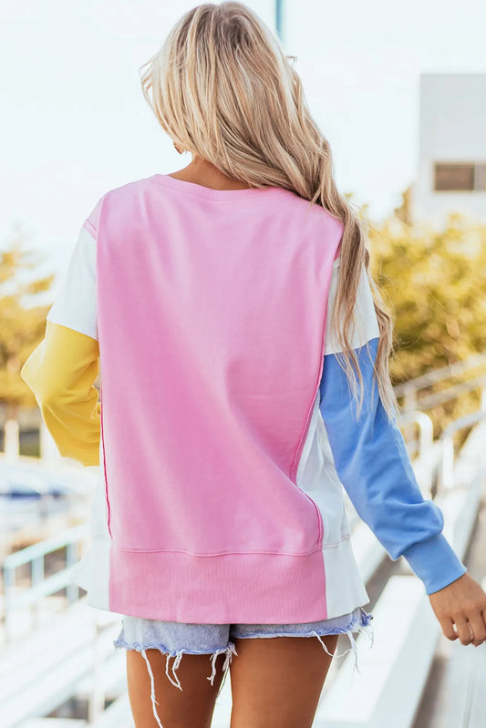 Soft, breathable sweatshirt in pink, blue, yellow, and white.
