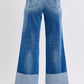 High waist wide-leg jeans with edgy distressed details
