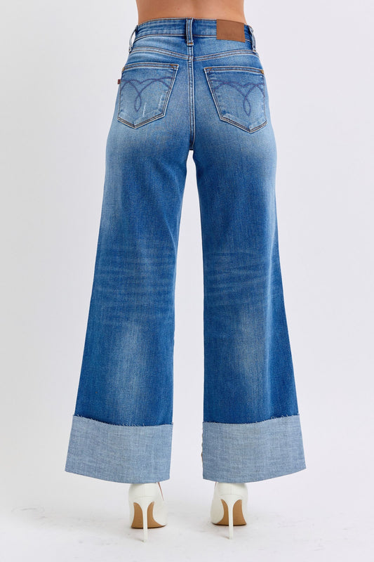 High waist wide-leg jeans with edgy distressed details
