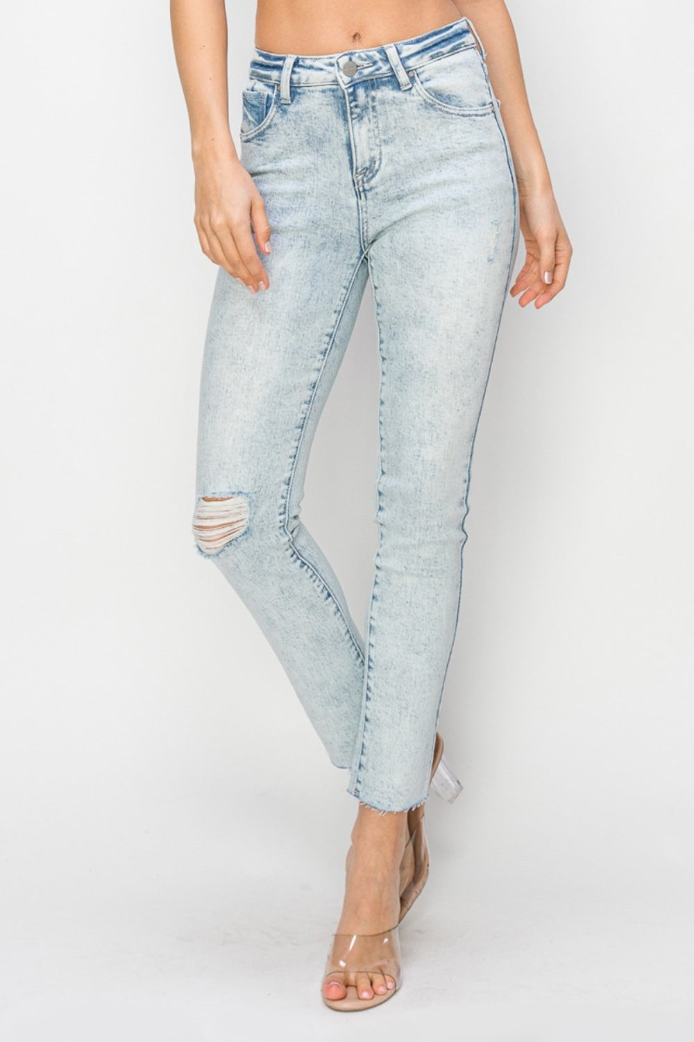 RISEN light-wash high-rise skinny jeans with edgy distressed touches
