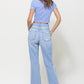 Women's flare jeans with a retro 90's feel and frayed hems
