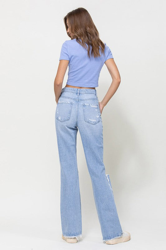 Women's flare jeans with a retro 90's feel and frayed hems
