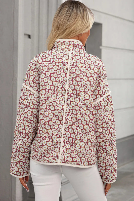 Women’s floral snap-down coat with a trendy mock neck design.

