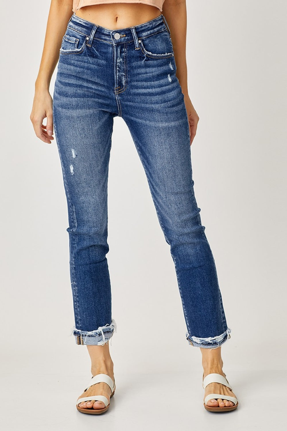 High-rise straight leg jeans with frayed, rolled cuffs and distressed detailing
