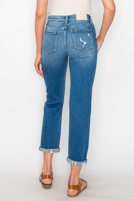 Trendy high-rise tapered jeans with cuffed ankles and a comfortable fit.
