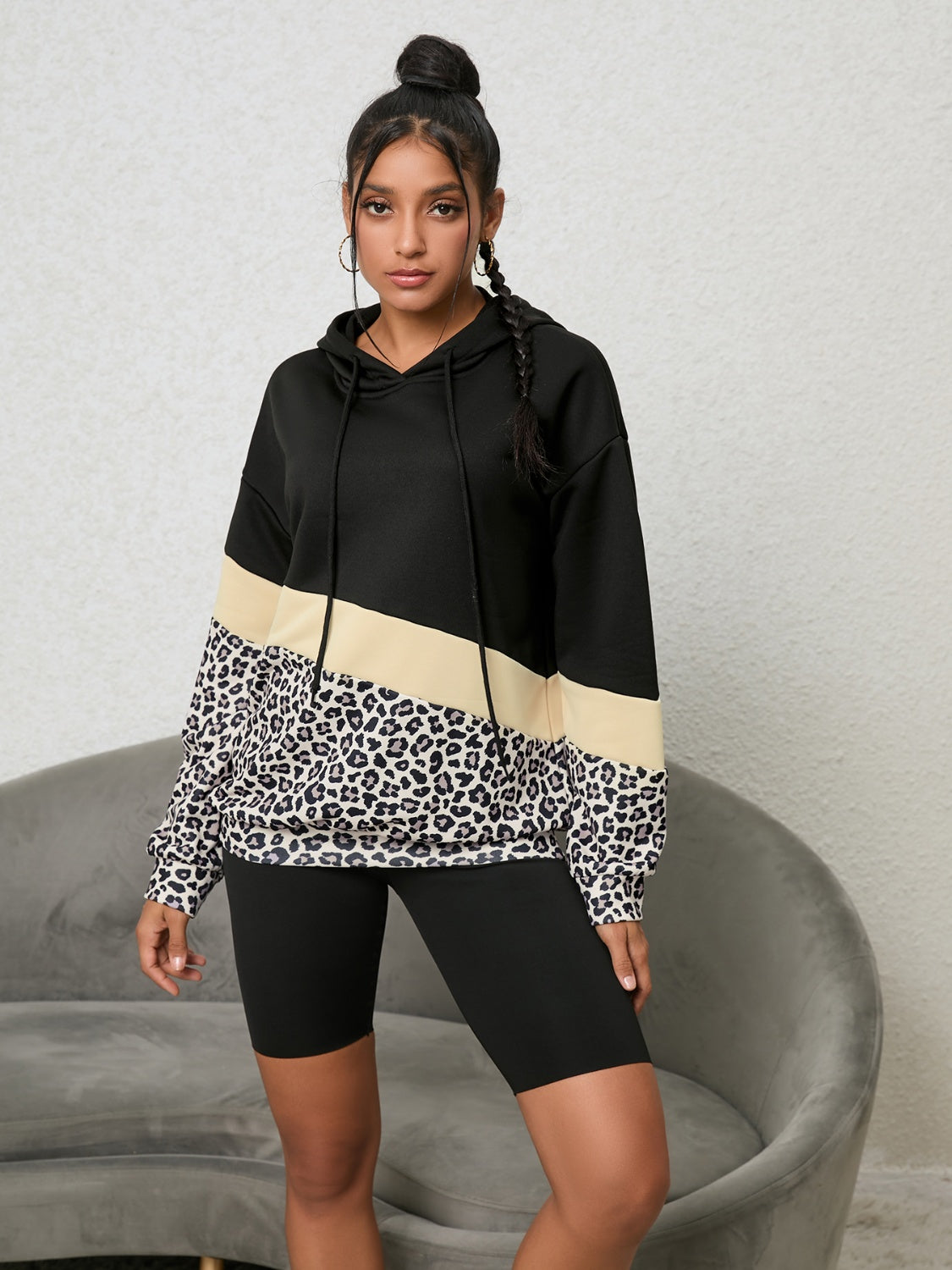 trendy leopard print hoodie with color block design
