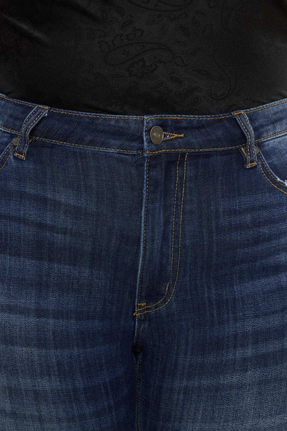 Close-up of dark wash Kancan flare jeans with slight stretch
