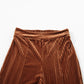 Trendy mocha flare pants with a high-waist design to elongate the legs.
