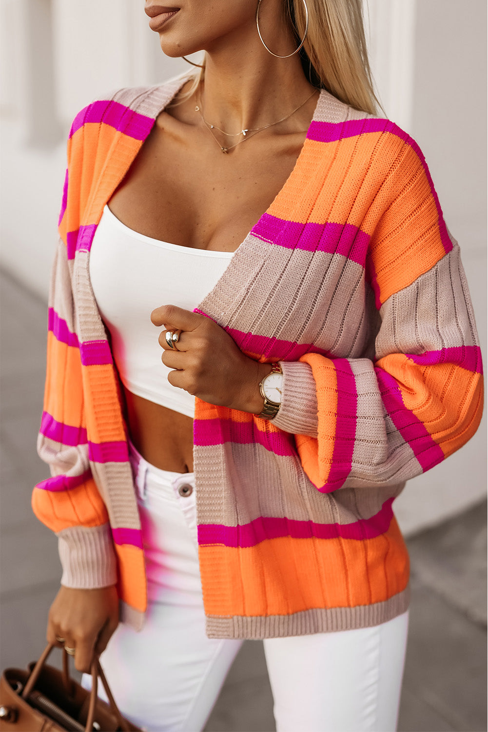 Open-front cardigan with bold orange and fuchsia stripes
