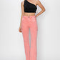 Trendy pink cargo jeans with a bootcut style, front view