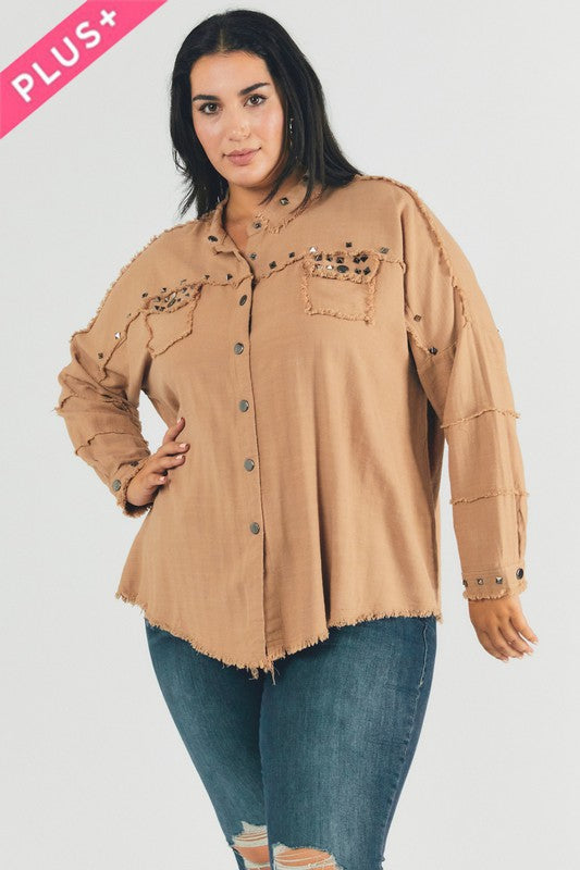 Women's plus-size casual shirt with a loose fit and trendy distressed hem.
